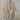 Oversized Linen Cream Blouse on a hanger against a wooden background
