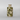 Ceramic vase with green olive leaf pattern on a white background
