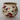 Ceramic pot with floral and pomegranate patterns on a white background