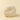 A round, cream-coloured cushion with a central button and radiating pleats