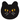 A black cat-shaped rug or mat with embroidered yellow eyes, a pink nose, and white whiskers on a plain white background.
