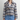 A woman modeling a cropped plaid coat with a wide collar, worn over a white top and blue jeans, against a plain light gray studio background.